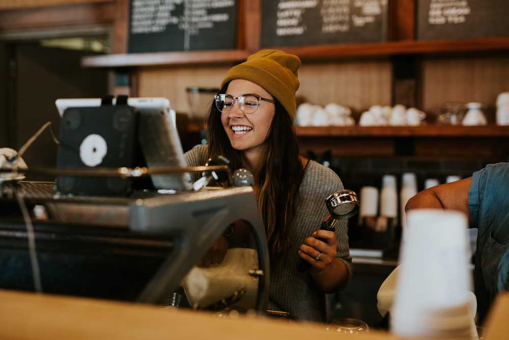 Coffee shop barista making an espresso